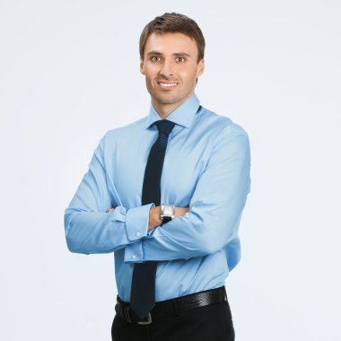 Gri üzerinde mutlu işadamı