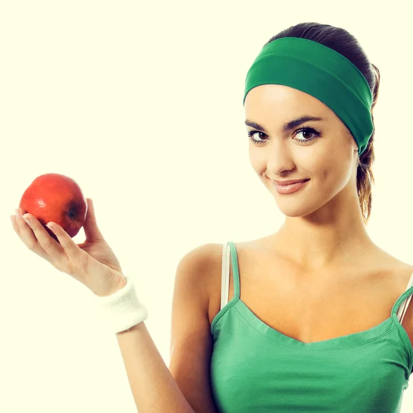 Jeune femme avec pomme — Photo