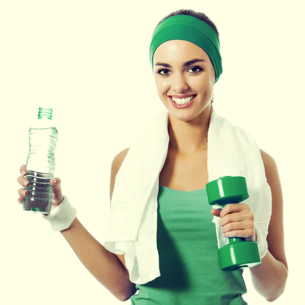 Woman with dumbbell and water — Stock Photo, Image