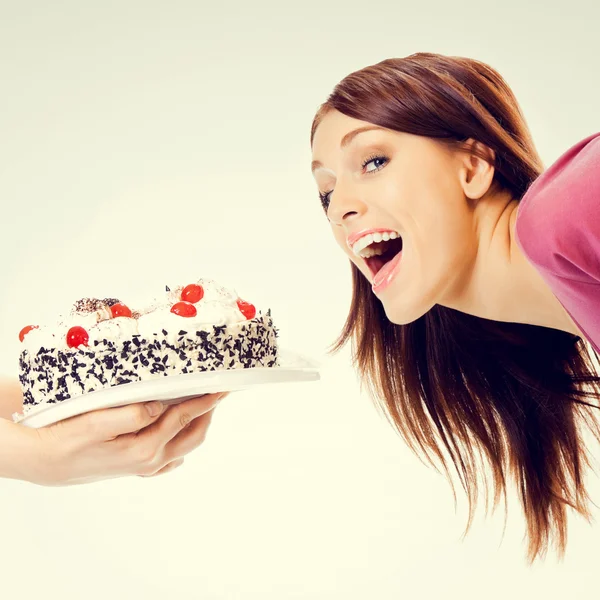 Retrato de una hermosa mujer comiendo pastel —  Fotos de Stock