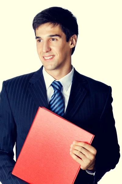 Smiling businessman with red folder — Stock Photo, Image