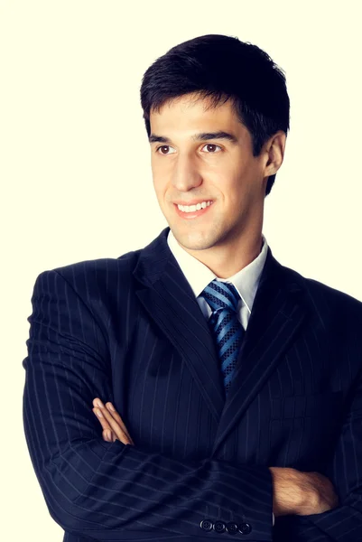 Porträt eines glücklich lächelnden jungen Geschäftsmannes — Stockfoto