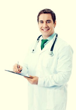 Doktor panoya yazı yazıyor.