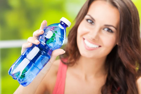 Young woman with water — Stock Photo, Image