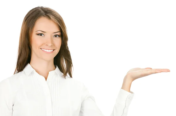 Mujer de negocios mostrando algo o sosteniendo, en blanco — Foto de Stock