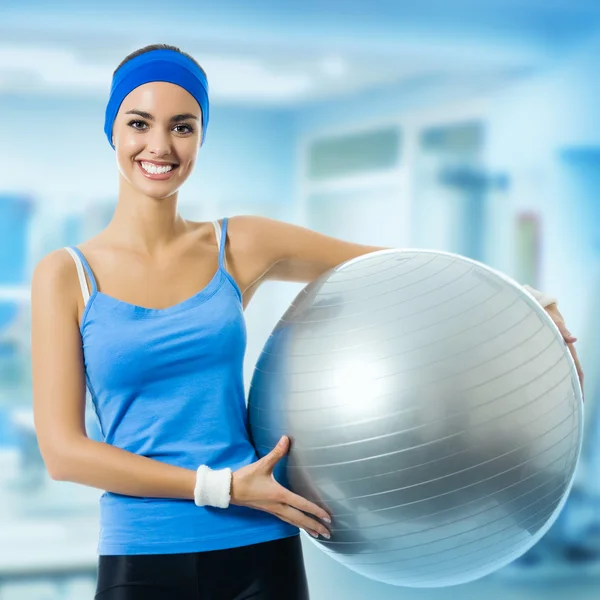 Young beautiful woman with fitness ball — Stock Photo, Image