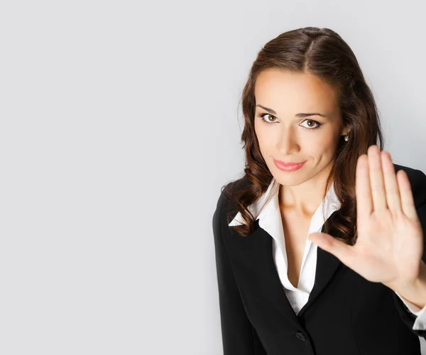 Businesswoman with stop gesture, with copyspace — Stock Photo, Image