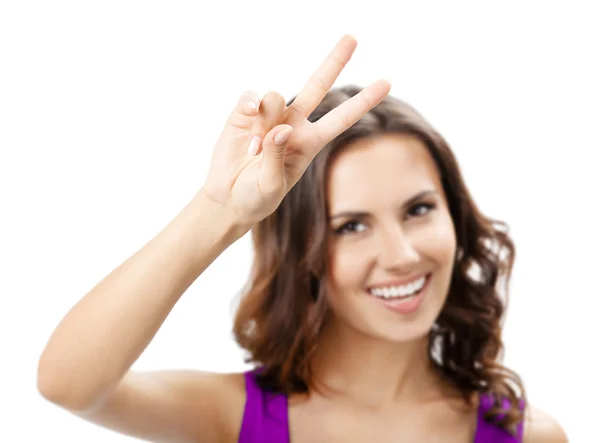 Žena ukazuje dva prsty nebo vítězství gesto, přes bílý — Stock fotografie