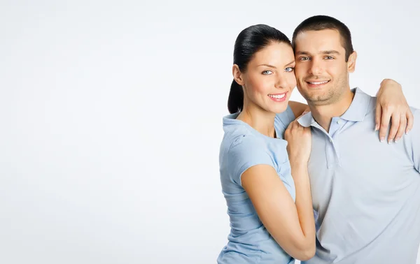 Cheerful young lovely couple, with copyspace — Stock Photo, Image