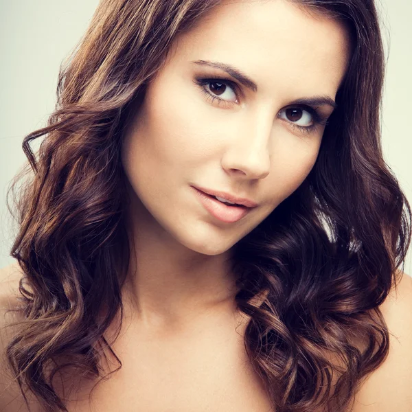 Portrait of beautiful young brunette woman — Stock Photo, Image