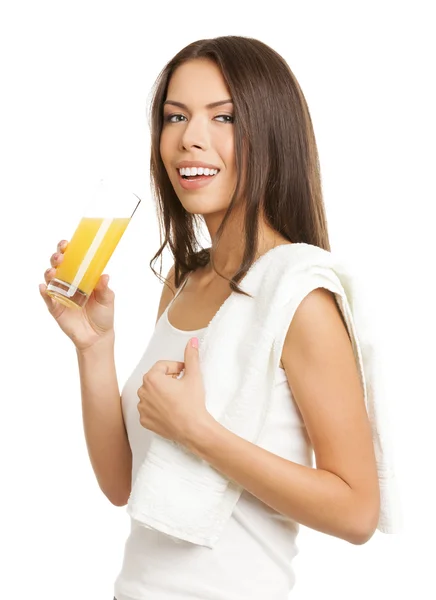 Smiling brunette woman drinking lemon or orange citrus juice, is — Stock Photo, Image