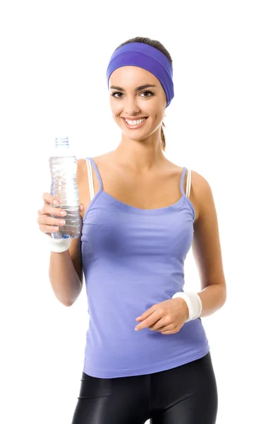 Woman in violet sportswear with bottle of water and dumbbell, is — Stock Photo, Image