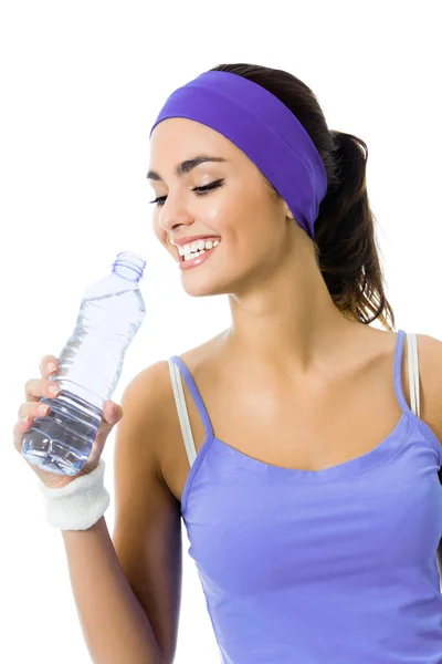 Donna in abbigliamento sportivo viola acqua potabile, isolata — Foto Stock