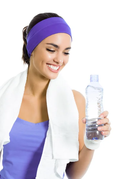 Vrouw in violet sportkleding drinkwater, geïsoleerd — Stockfoto