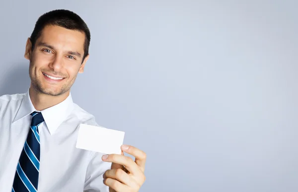 Businessman giving businesscard, with copyspace — Stock Photo, Image