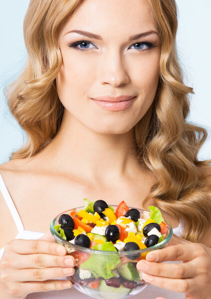 Woman with vegetarian salad
