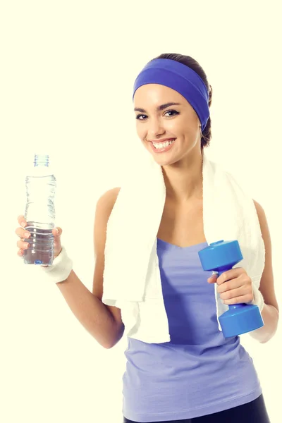 Feliz mujer sonriente en ropa deportiva violeta con botella de agua y —  Fotos de Stock