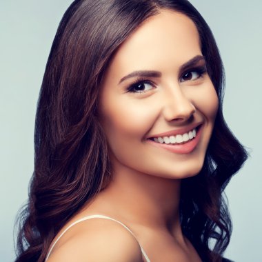 Portrait of smiling young lovely woman