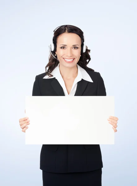 Young happy female support phone operator with signboard — Stok fotoğraf