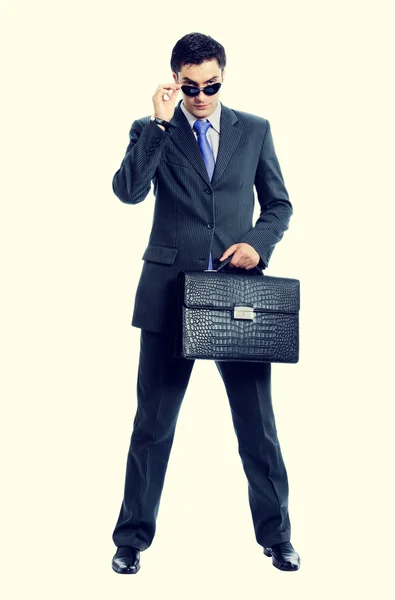 Businessman or hacker in sun glasses with briefcase — Stock Photo, Image