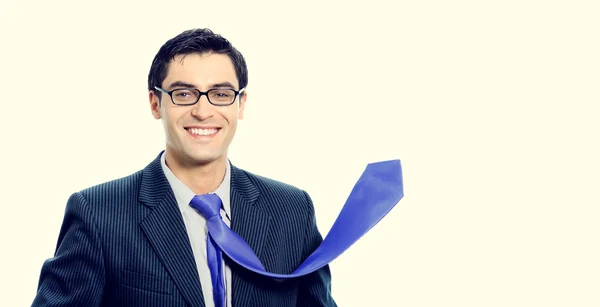 Young businessman with raised up blue tie — Stock Photo, Image