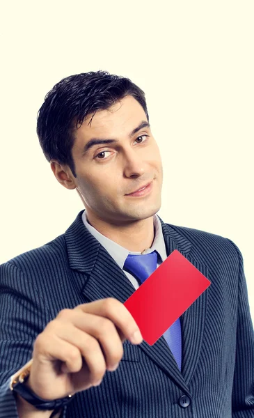 Empresário dando cartão vermelho em branco — Fotografia de Stock