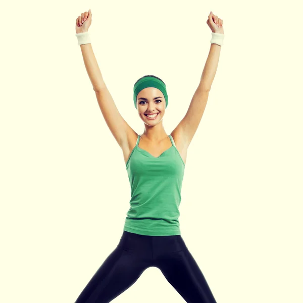 Cheerful smiling jumping woman — Stockfoto