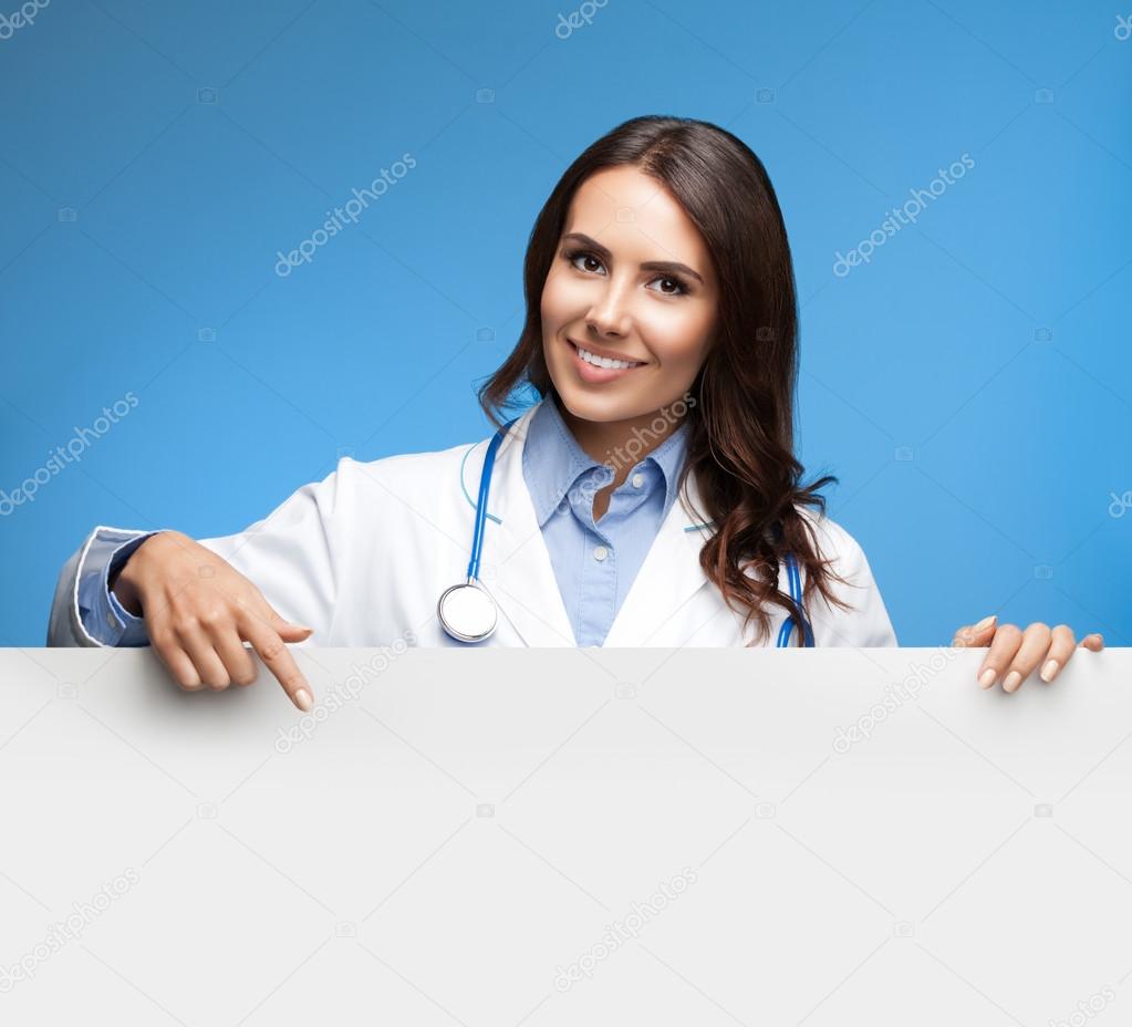 female doctor showing blank signboard, over blue