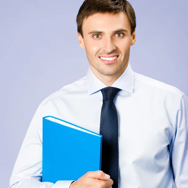 Businessman with folder, on violet — Stock Photo, Image