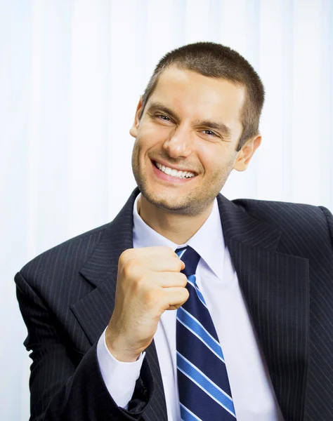 Happy successful gesturing businessman — Stock Photo, Image