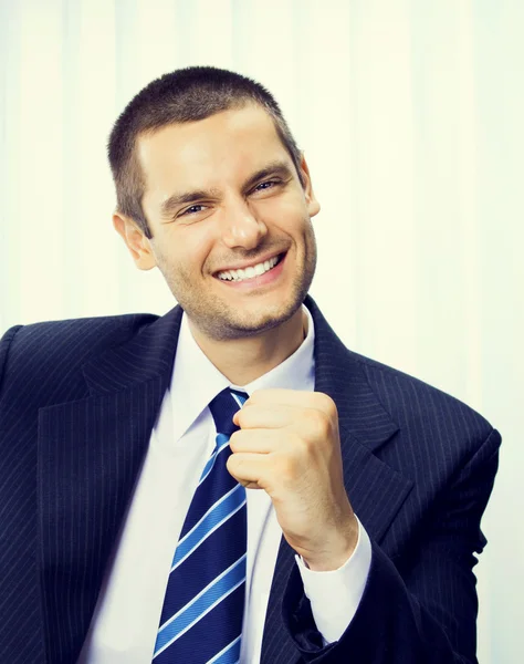 Happy gesturing businessman — Stock Photo, Image