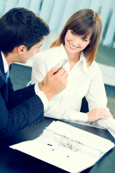 Two businesspeople working together at office — Stock Photo, Image