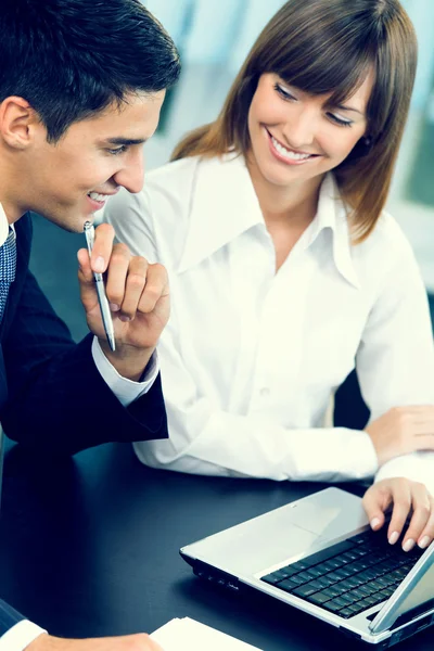 Two businesspeople working together at office — Stock Photo, Image