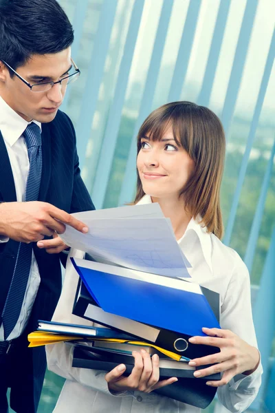 Two businesspeople working together at office — Stock Photo, Image