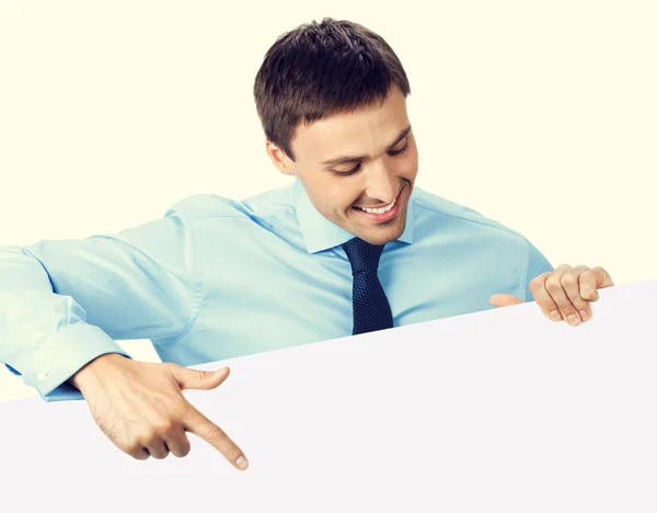 Businessman showing signboard — Stock Photo, Image