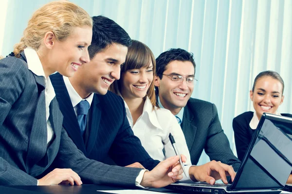 Successful business team working together at office Stock Photo