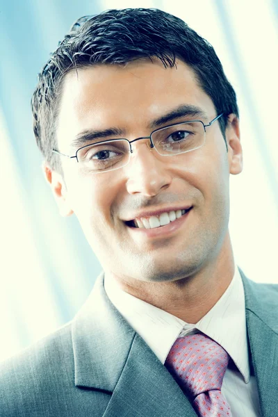 Portrait of smiling businessman at office — Stock Photo, Image