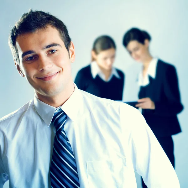 Three young successful businesspeople working at office — Stock Photo, Image