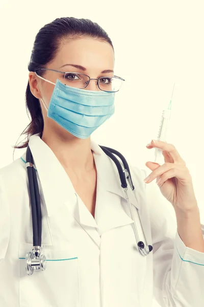 Medico in maschera protettiva con siringa — Foto Stock