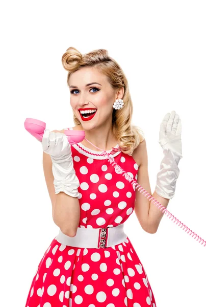 Smiling woman with phone, dressed in pin-up style dress — Stock Photo, Image