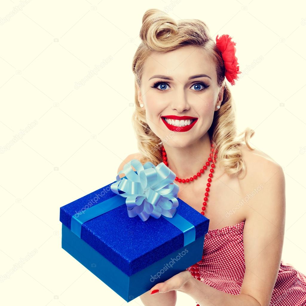 woman in pin-up style clothing with gift box