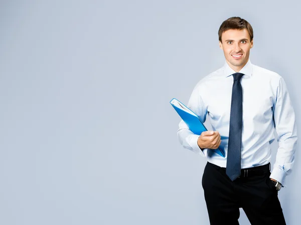 Business man with folder, with copyspace — Stock Photo, Image