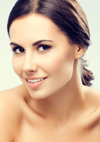Portrait of beautiful smiling young woman Stock Photo