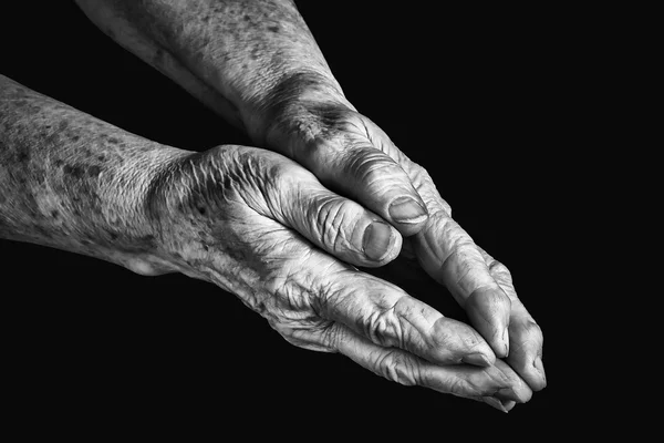 Два старших руки — стокове фото