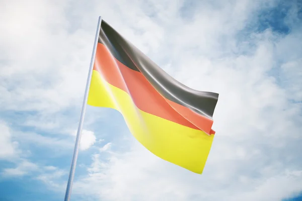 Waving German flag on a sky background — Stock Photo, Image