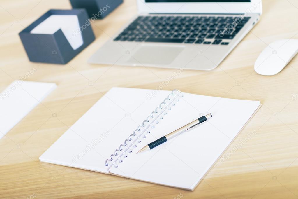 Table with keyboard and copybook