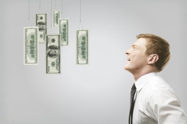 Man looking at money clipart