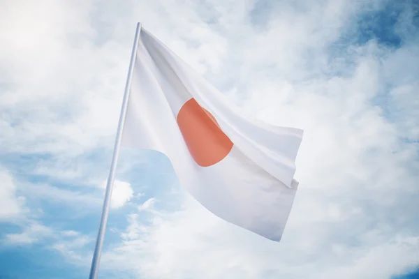 Japanse vlag op de hemelachtergrond — Stockfoto