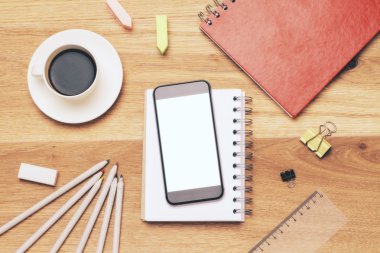 Beyaz smartphone ve not defteri