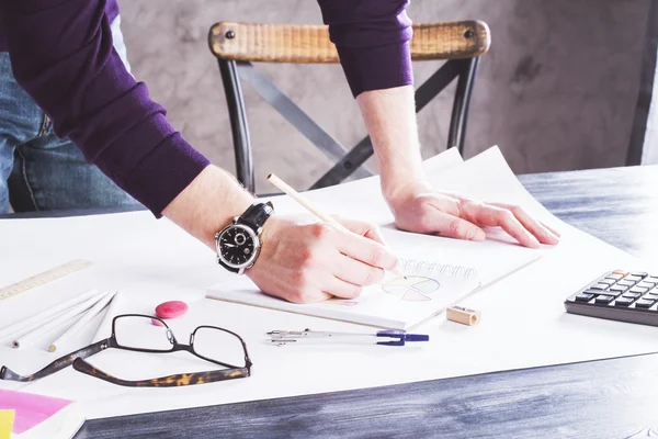 Man drawing charts side — Stock Photo, Image